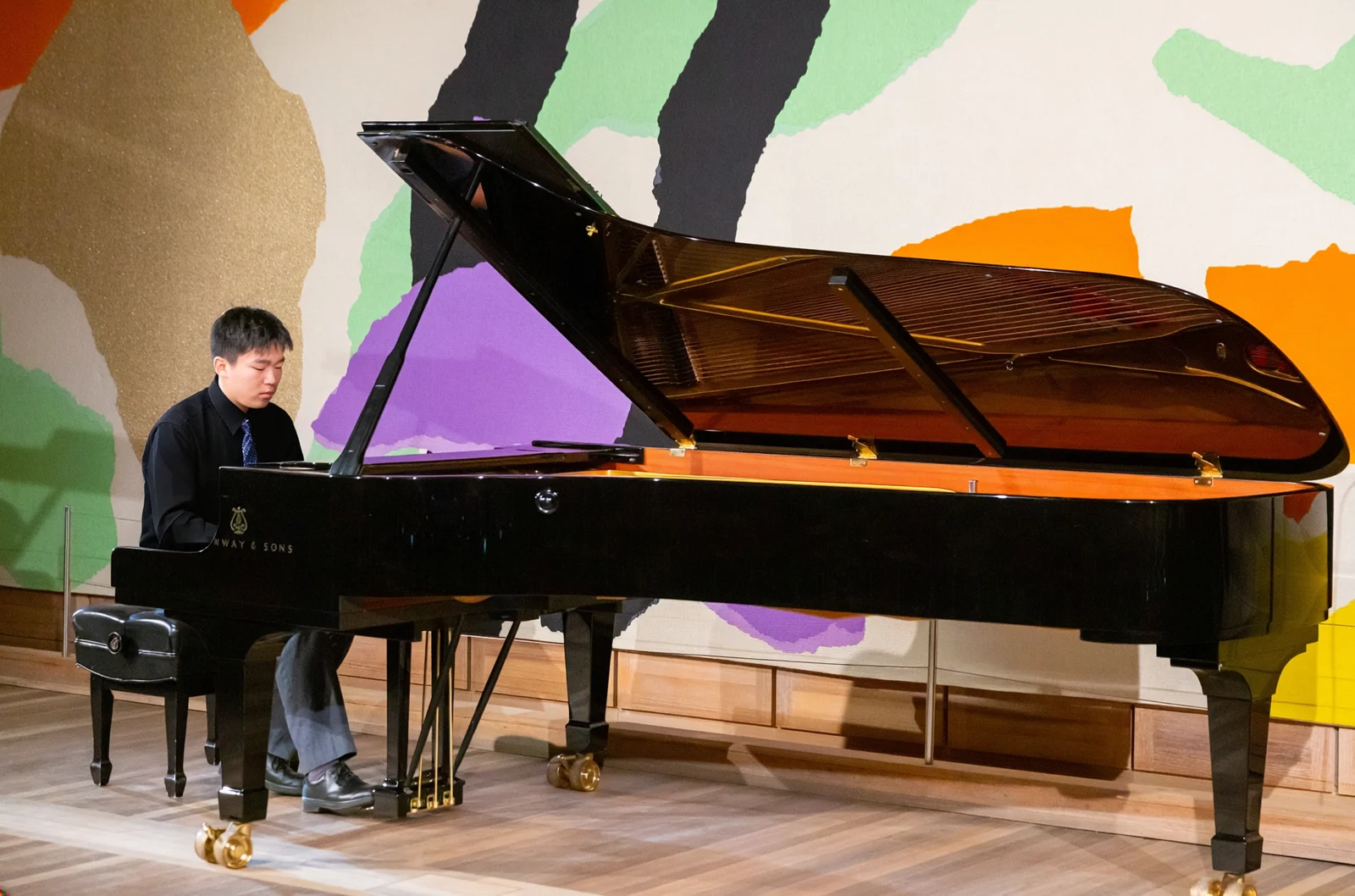 Cameron Lu at the piano
